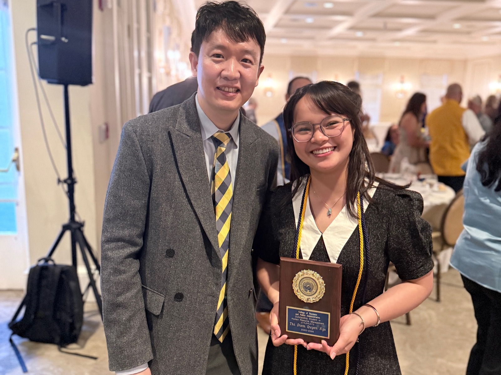 Quyen Ngo receiving Outstanding Student in Human Resource Management at the BPA Honors Banquet 2026