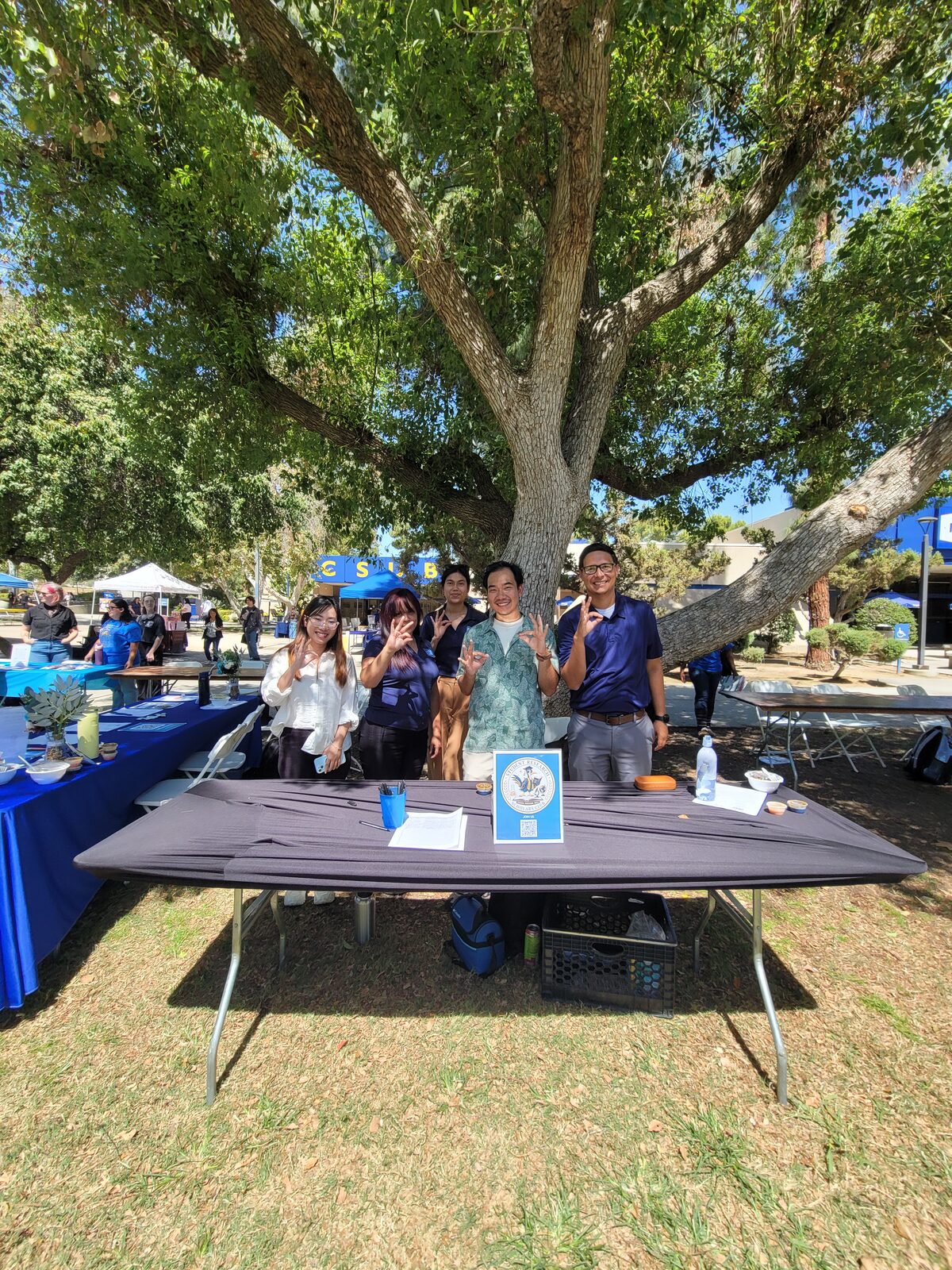 The SRSC table at the Fall 2026 CSUB club fair, set up under a tree on the campus lawn