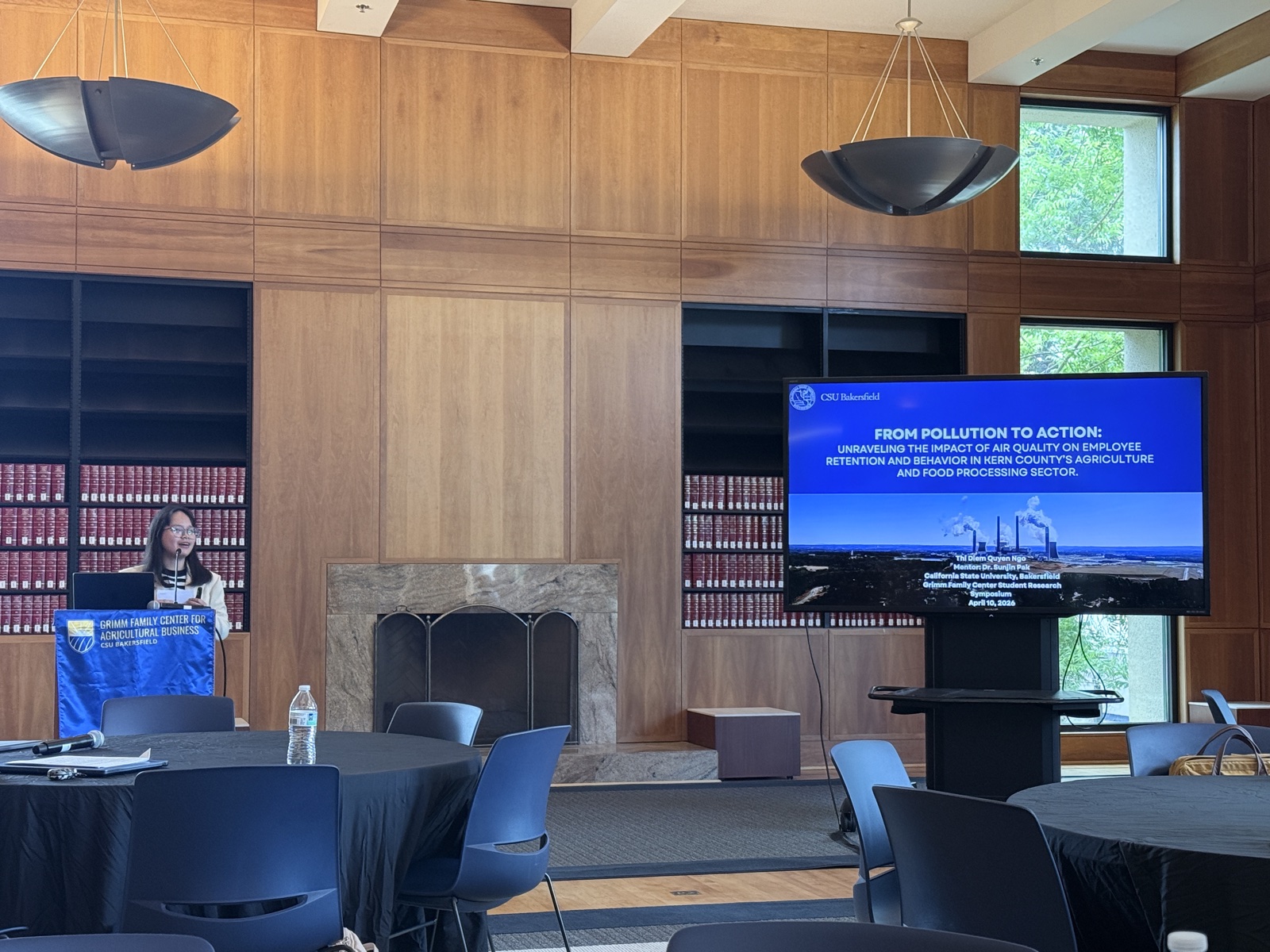 Quin Ngo presenting at GFCAB Student Research Symposium 2026